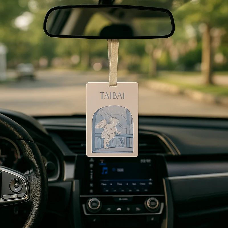 Blue angel illustration car air freshener hanging from rearview mirror with fresh fruity or lemon citrus scent