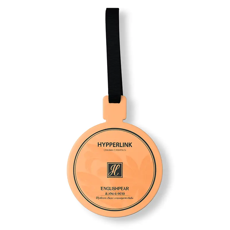 Orange round paper air freshener with black ribbon in English Pear & Freesia scent