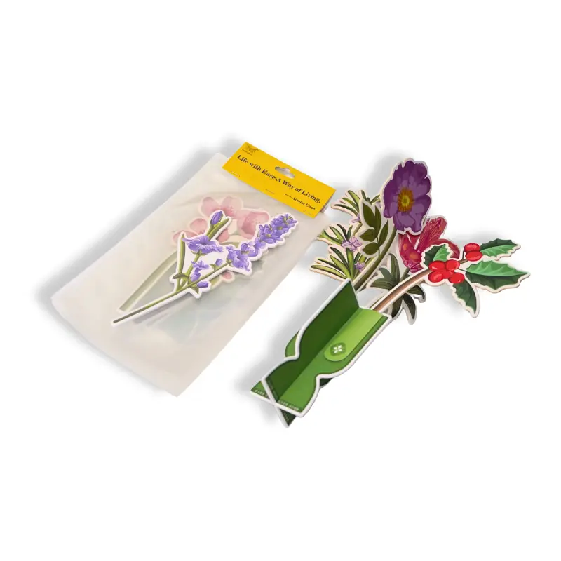 Flat lay of floral paper air freshener and vacuum-sealed package
