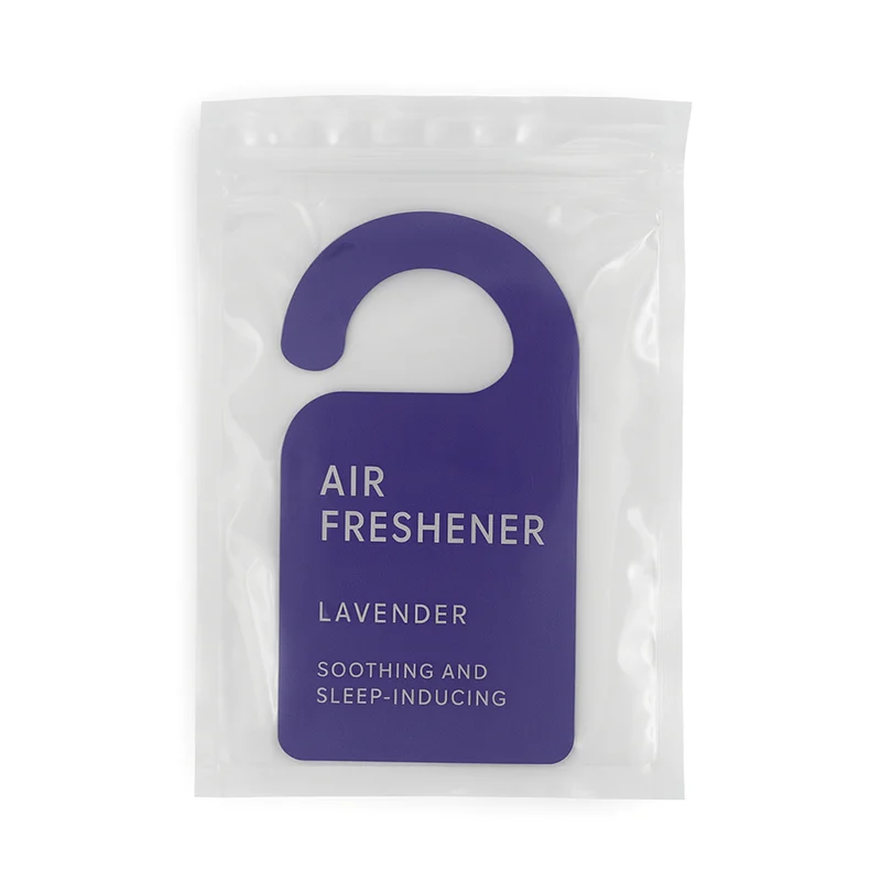 Hotel sleep-themed lavender air freshener hanging on a door handle